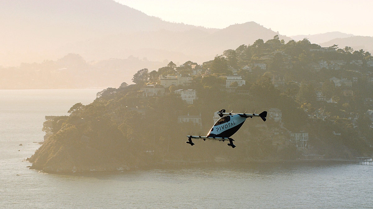 Helix flying above water.