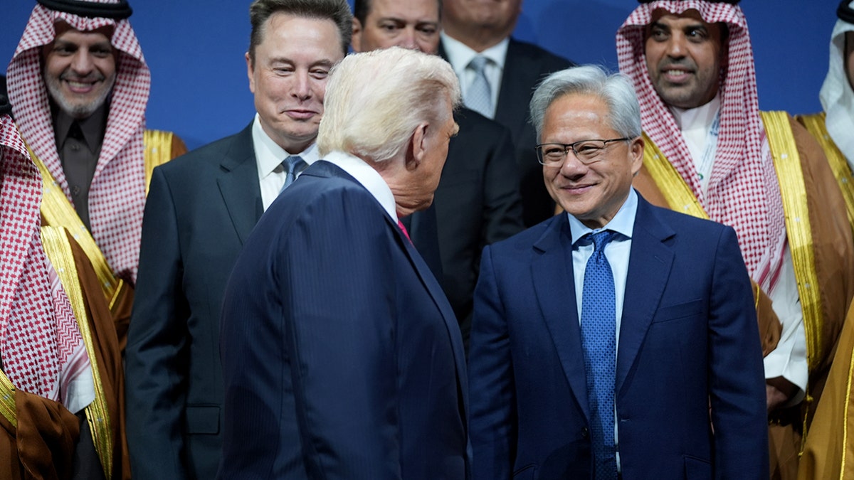 President Donald Trump with Elon Musk and Nvidia CEO Jensen Huang