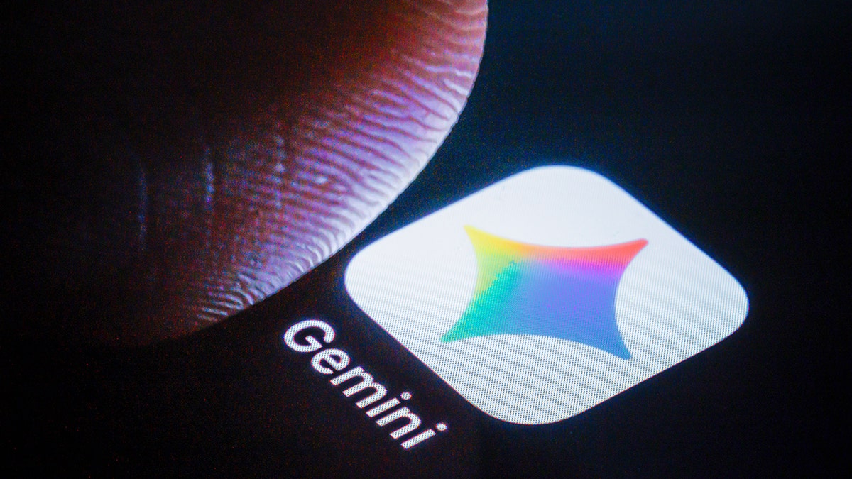 Person about to press the Gemini app.