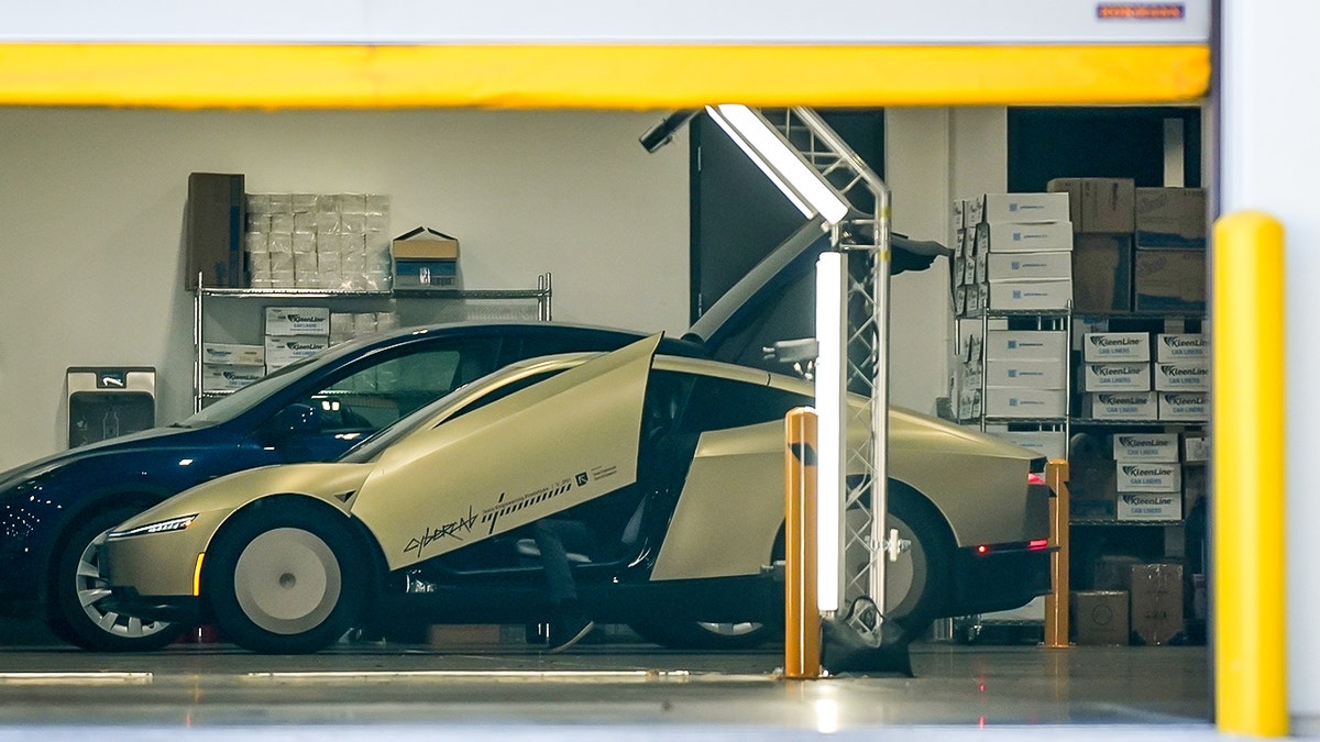 A CyberCab in a factory.